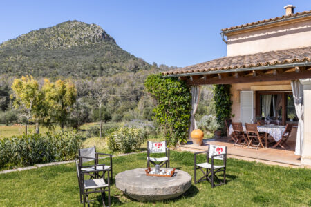 Outdoor Resting Area In Tranquil Country Finca With Garden Pool And Workspace