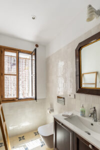 Bathrooms In Renovated Three Bedroom Apartment Near Ramblas
