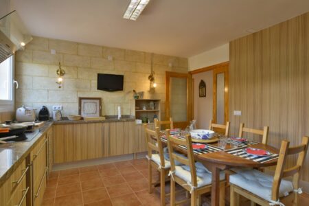 Kitchen And Dining Area In Three Bedroom Apartment With A Terrace In Palmanova