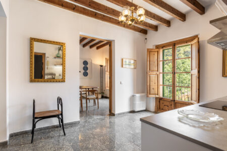 Kitchen Area In Renovated Three Bedroom Apartment Near Ramblas