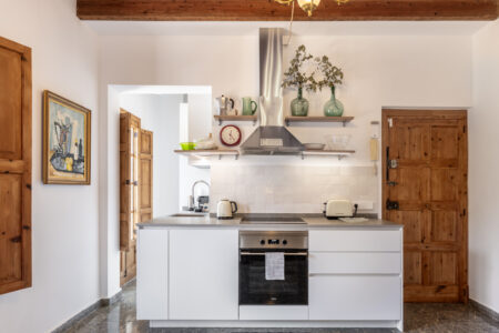 Kitchen Area In Renovated Three Bedroom Apartment Near Ramblas