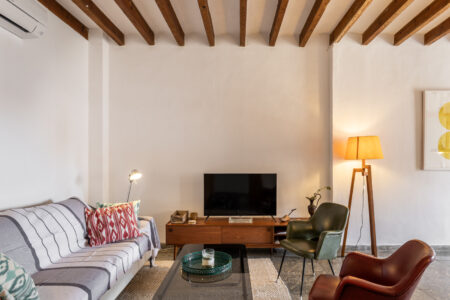 Living Area In Renovated Three Bedroom Apartment Near Ramblas