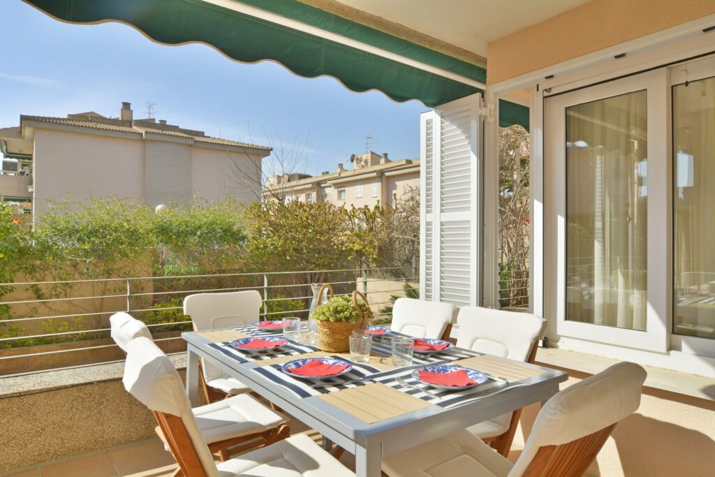 Terrace Dining Area In Three Bedroom Apartment With A Terrace In Palmanova